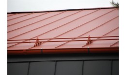 Фальц двойной стоячий Grand Line 0,5 Satin Matt с пленкой на замках RAL 8004 терракота